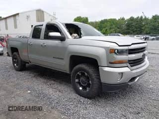 2019 Chevrolet Silverado 1500 LT z VIN 2GCVKPEC1K1239334, wystawiony jako IAAI lot #42583409 z przebiegiem 71 407 mil mil oraz . Historia ofert i sprzedaży dostępna na DreamBid. Obrazek 1.