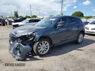 ✅ 2013 Mazda CX-5 Grand Touring • VIN: JM3KE4DE3D0165190 • Lot: 80802415. Listed on Copart with 195,846 mi. Free auction sales archive from the USA and detailed vehicle history report at DreamBid. Image 1.