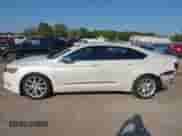 2014 Chevrolet Impala LTZ with VIN 1G1155S32EU122071, listed as a IAAI auction lot 43344345 with 151,734 mi miles and . Bid and sale history available at DreamBid. Image 15.