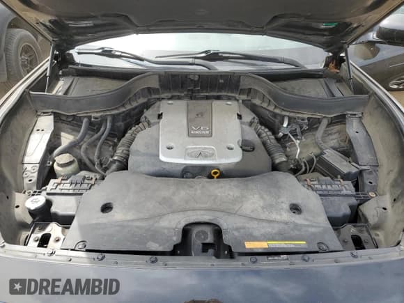 ✅ 2015 Infiniti QX70 • VIN: JN8CS1MW4FM483865 • Lot: 57000365. Listed on Copart with 152,533 mi. Free auction sales archive from the USA and detailed vehicle history report at DreamBid. Image 11.
