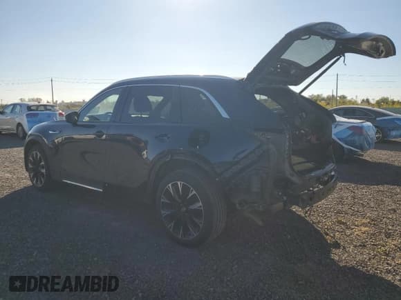 ✅ 2024 Mazda CX-90 Premium • VIN: JM3KKDHA3R1166518 • Лот: 85121295. Опубликован ранее на Copart с пробегом 23 875 миль. Бесплатный доступ к архиву аукционных продаж из США и подробный отчёт об истории автомобиля на DreamBid. Изображение 2.