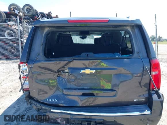 2017 Chevrolet Suburban Premier with VIN 1GNSKJKC1HR403063, listed as a IAAI auction lot 43092501 with 163,931 mi miles and . Bid and sale history available at DreamBid. Image 6.