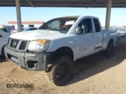 ✅ 2004 Nissan Titan SE • VIN: 1N6AA06B34N573376 • Lot: 43531594. Listed on IAAI with 222,146 mi. Free auction sales archive from the USA and detailed vehicle history report at DreamBid. Image 2.