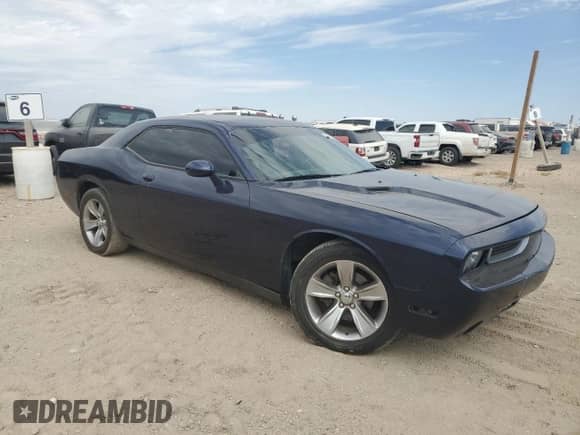 2014 Dodge Challenger SXT z VIN 2C3CDYAG5EH225579, wystawiony jako Copart lot #72506064 z przebiegiem 155 352 mil mil oraz Szkoda całkowita • Salvage title. Historia ofert i sprzedaży dostępna na DreamBid. Obrazek 4.