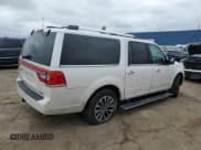 ✅ 2015 Lincoln Navigator • VIN: 5LMJJ3JT2FEJ14453 • Lot: 58723115. Listed on Copart with 154,651 mi. Free auction sales archive from the USA and detailed vehicle history report at DreamBid. Image 3.