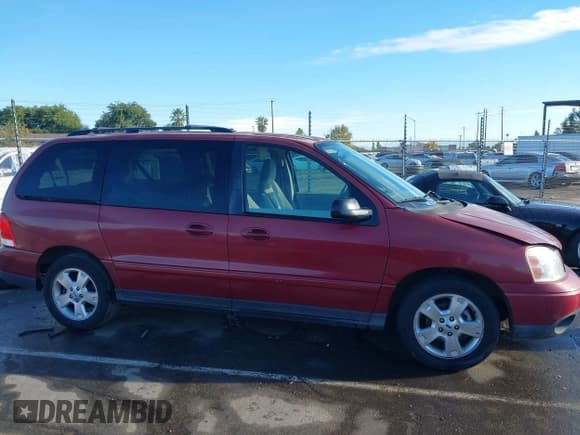 ✅ 2005 Ford Freestar • VIN: 2FMDA57655BA39691 • Lot: 43442137. Listed on IAAI with 192,705 mi. Free auction sales archive from the USA and detailed vehicle history report at DreamBid. Image 14.