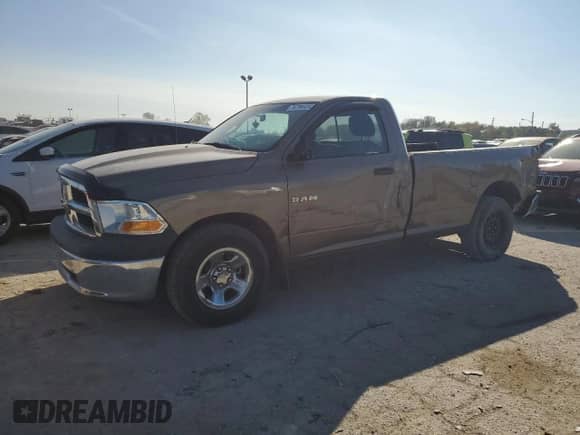2010 Dodge 1500 ST с VIN 3D7JB1EP7AG105745, выставлен на аукционе Copart как лот 76799434 с пробегом 119 475 миль миль и Списание • Salvage title. История ставок и продаж доступна на DreamBid. Изображение 1.