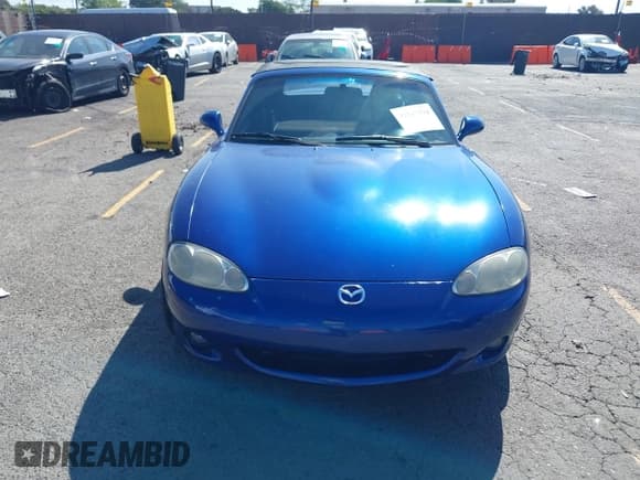 ✅ 2003 Mazda MX-5 Miata Cloth • VIN: JM1NB353830301964 • Лот: 42317534. Опубликован ранее на IAAI с пробегом 192 342 миль. Бесплатный доступ к архиву аукционных продаж из США и подробный отчёт об истории автомобиля на DreamBid. Изображение 12.