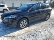 ✅ 2015 Mazda CX-9 Sport • VIN: JM3TB2BA4F0450064 • Lot: 86707144. Listed on Copart with 163,743 mi. Free auction sales archive from the USA and detailed vehicle history report at DreamBid. Image 1.