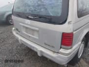 ✅ 1992 Plymouth Voyager • VIN: 2P4GH2537NR728610 • Lot: 42882486. Listed on IAAI with 164,488 mi. Free auction sales archive from the USA and detailed vehicle history report at DreamBid. Image 18.