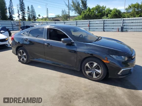 ✅ 2020 Honda Civic LX • VIN: 2HGFC2F62LH508836 • Lot: 69257665. Listed on Copart with 98,804 mi. Free auction sales archive from the USA and detailed vehicle history report at DreamBid. Image 4.