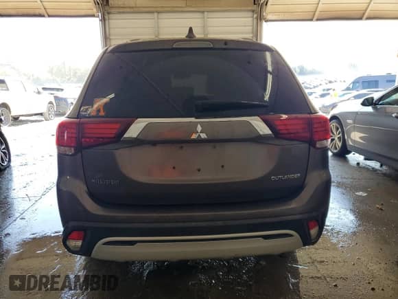 2019 Mitsubishi Outlander ES z VIN JA4AD2A32KZ022703, wystawiony jako Copart lot #71704365 z przebiegiem 137 131 mil mil oraz Szkoda całkowita • Salvage title. Historia ofert i sprzedaży dostępna na DreamBid. Obrazek 6.