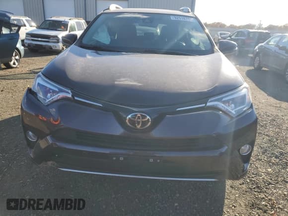 ✅ 2017 Toyota RAV4 Limited • VIN: 2T3DFREV1HW598826 • Lot: 92516785. Listed on Copart with 124,182 mi. Free auction sales archive from the USA and detailed vehicle history report at DreamBid. Image 5.