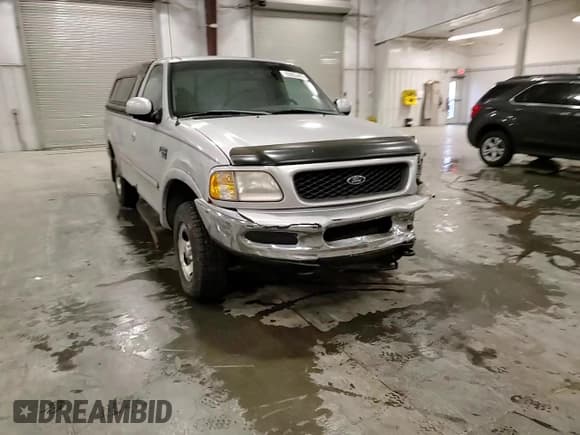✅ 1998 Ford F-150 • VIN: 2FTZF18W0WCA82169 • Lot: 93003405. Listed on Copart with 193,168 mi. Free auction sales archive from the USA and detailed vehicle history report at DreamBid. Image 13.