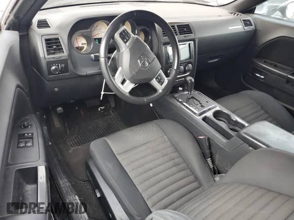 2013 Dodge Challenger SXT с VIN 2C3CDYAG5DH569458, выставлен на аукционе Copart как лот 80282775 с пробегом 120 537 миль миль и Списание • Salvage title. История ставок и продаж доступна на DreamBid. Изображение 8.