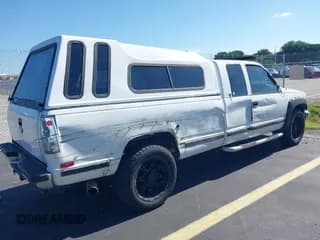 ✅ 2000 Chevrolet Silverado 2500 • VIN: 1GCGC29J4YF429311 • Lot: 43014830. Wystawiony na IAAI z przebiegiem 196 712 mil. Bezpłatny archiwum sprzedaży aukcyjnych z USA i szczegółowy raport historii pojazdu na DreamBid. Zdjęcie 4.