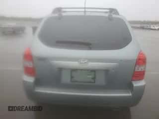 2006 Hyundai Tucson GL z VIN KM8JM12BX6U432539, wystawiony jako Copart lot #84570944 z przebiegiem 93 077 mil mil oraz Czysty tytuł • Clean title. Historia ofert i sprzedaży dostępna na DreamBid. Obrazek 6.