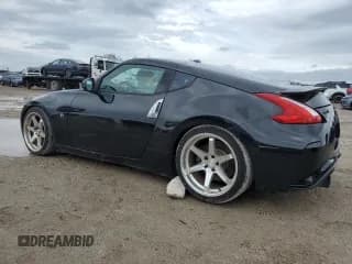 ✅ 2009 Nissan 370Z Touring • VIN: JN1AZ44E29M406023 • Лот: 73721324. Опубликован ранее на Copart с пробегом 108 072 миль. Бесплатный доступ к архиву аукционных продаж из США и подробный отчёт об истории автомобиля на DreamBid. Изображение 2.
