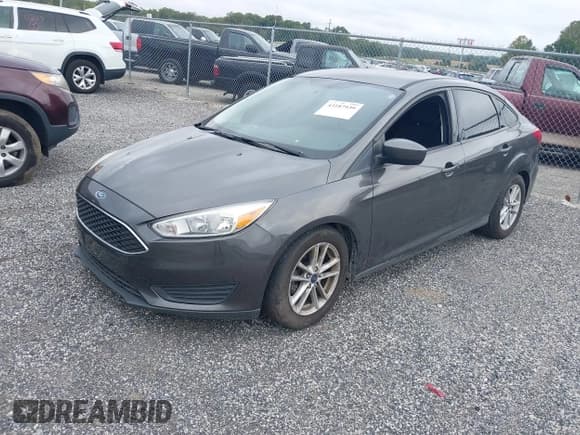 ✅ 2018 Ford Focus SE • VIN: 1FADP3F29JL240516 • Лот: 43187939. Опубликован ранее на IAAI с пробегом 144 455 миль. Бесплатный доступ к архиву аукционных продаж из США и подробный отчёт об истории автомобиля на DreamBid. Изображение 2.