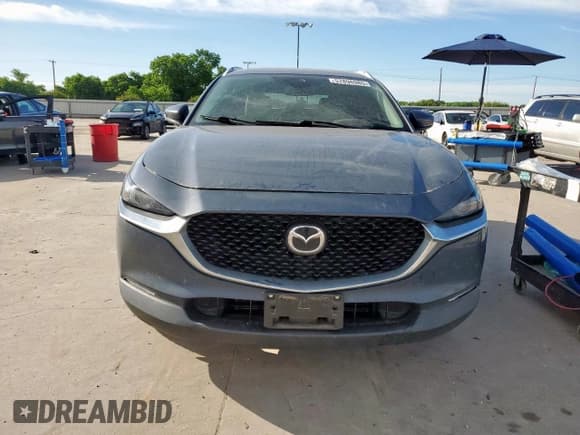 ✅ 2020 Mazda CX-30 Premium • VIN: 3MVDMAEMXLM125319 • Lot: 57896985. Wystawiony na Copart z przebiegiem 117 692 mil. Bezpłatny archiwum sprzedaży aukcyjnych z USA i szczegółowy raport historii pojazdu na DreamBid. Zdjęcie 5.