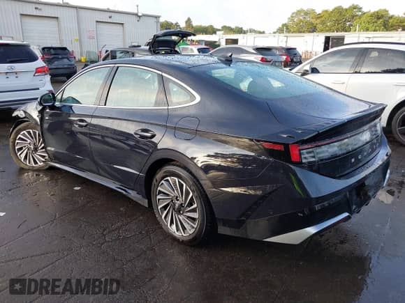 2024 Hyundai Sonata Limited with VIN KMHL54JJ4RA097929, listed as a IAAI auction lot 43276187 with 5,555 mi miles and . Bid and sale history available at DreamBid. Image 3.
