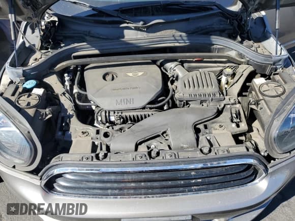 ✅ 2018 MINI Countryman Cooper • VIN: WMZYV5C33J3E02847 • Lot: 80296555. Wystawiony na Copart z przebiegiem 69 370 mil. Bezpłatny archiwum sprzedaży aukcyjnych z USA i szczegółowy raport historii pojazdu na DreamBid. Zdjęcie 12.