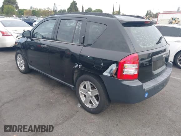 ✅ 2007 Jeep Compass Sport • VIN: 1J8FT47067D399300 • Lot: 43085577. Listed on IAAI with 130,898 mi. Free auction sales archive from the USA and detailed vehicle history report at DreamBid. Image 3.