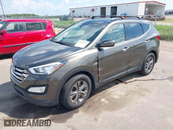 ✅ 2014 Hyundai Santa Fe • VIN: 5XYZUDLB1EG227778 • Lot: 43033757. Listed on IAAI with 135,496 mi. Free auction sales archive from the USA and detailed vehicle history report at DreamBid. Image 2.