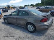 ✅ 2002 Pontiac Grand Am SE1 • VIN: 1G2NF52F42C283088 • Lot: 57897425. Listed on Copart with 139,473 mi. Free auction sales archive from the USA and detailed vehicle history report at DreamBid. Image 2.