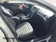 ✅ 2014 Ford Fusion S Hybrid • VIN: 3FA6P0UU1ER368851 • Лот: 43427270. Опубликован ранее на IAAI с пробегом 63 620 миль. Бесплатный доступ к архиву аукционных продаж из США и подробный отчёт об истории автомобиля на DreamBid. Изображение 5.