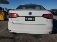 ✅ 2017 Volkswagen Jetta SE • VIN: 3VWDB7AJ2HM359884 • Лот: 92107135. Опубликован ранее на Copart с пробегом 31 748 миль. Бесплатный доступ к архиву аукционных продаж из США и подробный отчёт об истории автомобиля на DreamBid. Изображение 6.