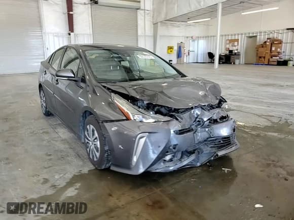 ✅ 2021 Toyota Prius LE • VIN: JTDL9MFU2M3023742 • Lot: 82576745. Listed on Copart with 121,819 mi. Free auction sales archive from the USA and detailed vehicle history report at DreamBid. Image 13.