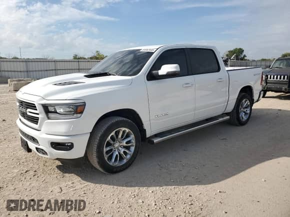 2023 Ram 1500 Laramie z VIN 1C6SRFJT9PN653506, wystawiony jako Copart lot #84952935 z przebiegiem 27 144 mil mil oraz Szkoda całkowita • Salvage title. Historia ofert i sprzedaży dostępna na DreamBid. Obrazek 1.