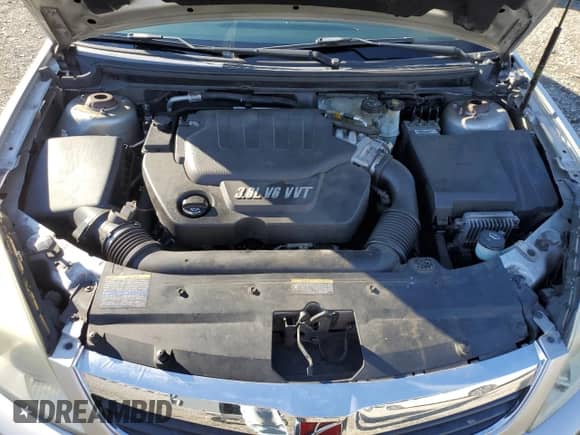 2007 Saturn Aura XR z VIN 1G8ZV57727F164957, wystawiony jako Copart lot #82691675 z przebiegiem 113 140 mil mil oraz Szkoda całkowita • Salvage title. Historia ofert i sprzedaży dostępna na DreamBid. Obrazek 11.