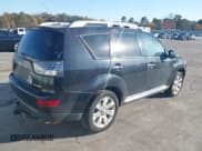 ✅ 2009 Mitsubishi Outlander SE • VIN: JA4LS31W69Z007971 • Lot: 43677824. Listed on IAAI with 200,683 mi. Free auction sales archive from the USA and detailed vehicle history report at DreamBid. Image 4.