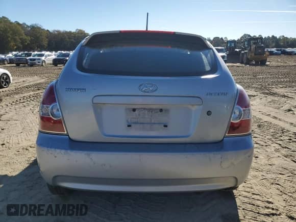 2007 Hyundai Accent GS with VIN KMHCM36C77U022368, listed as a Copart auction lot 82601945 with 150,964 mi miles and Salvage title. Bid and sale history available at DreamBid. Image 6.