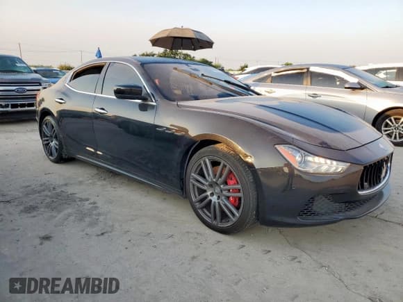 ✅ 2016 Maserati Ghibli S • VIN: ZAM57RSA0G1169785 • Lot: 67436765. Listed on Copart with 97,219 mi. Free auction sales archive from the USA and detailed vehicle history report at DreamBid. Image 4.