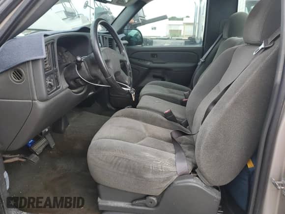 2004 Chevrolet Silverado 1500 LS z VIN 1GCEC14V04Z255175, wystawiony jako Copart lot #77254964 z przebiegiem Nie podano mil oraz Szkoda całkowita • Salvage title. Historia ofert i sprzedaży dostępna na DreamBid. Obrazek 7.