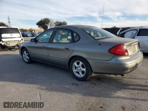 ✅ 2002 Ford Taurus SE Standard • VIN: 1FAFP53U92A164769 • Lot: 91718865. Listed on Copart with 133,695 mi. Free auction sales archive from the USA and detailed vehicle history report at DreamBid. Image 2.
