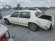 ✅ 1992 Cadillac DeVille • VIN: 1G6CD53B3N4236589 • Lot: 81304975. Listed on Copart with 174,359 mi. Free auction sales archive from the USA and detailed vehicle history report at DreamBid. Image 2.