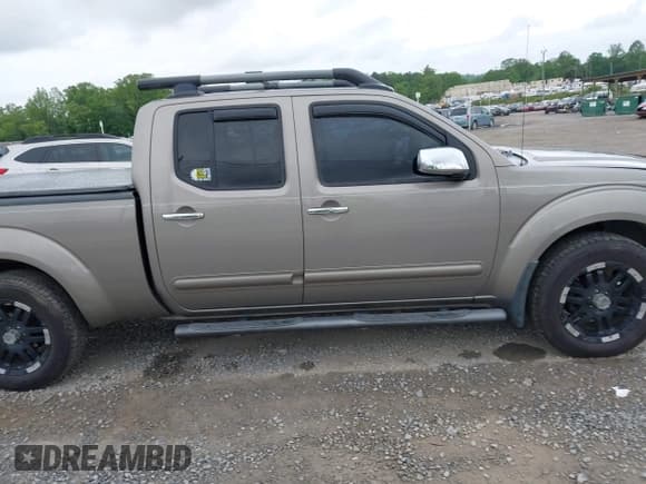 ✅ 2009 Nissan Frontier SE • VIN: 1N6AD09WX9C423595 • Лот: 42210046. Опубликован ранее на IAAI с пробегом 117 142 миль. Бесплатный доступ к архиву аукционных продаж из США и подробный отчёт об истории автомобиля на DreamBid. Изображение 13.