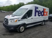 ✅ 2020 Ford Transit Cargo • VIN: 1FTBW3U88LKB34059 • Лот: 57055695. Опубликован ранее на Copart с пробегом 77 813 миль. Бесплатный доступ к архиву аукционных продаж из США и подробный отчёт об истории автомобиля на DreamBid. Изображение 1.