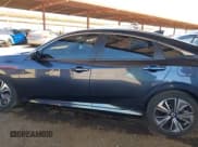 ✅ 2018 Honda Civic EX-L • VIN: JHMFC1F8XJX033602 • Лот: 42161015. Опубликован ранее на IAAI с пробегом 99 597 миль. Бесплатный доступ к архиву аукционных продаж из США и подробный отчёт об истории автомобиля на DreamBid. Изображение 14.
