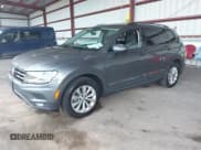 ✅ 2018 Volkswagen Tiguan S • VIN: 3VV0B7AX1JM009711 • Lot: 43117822. Listed on IAAI with 133,173 mi. Free auction sales archive from the USA and detailed vehicle history report at DreamBid. Image 2.