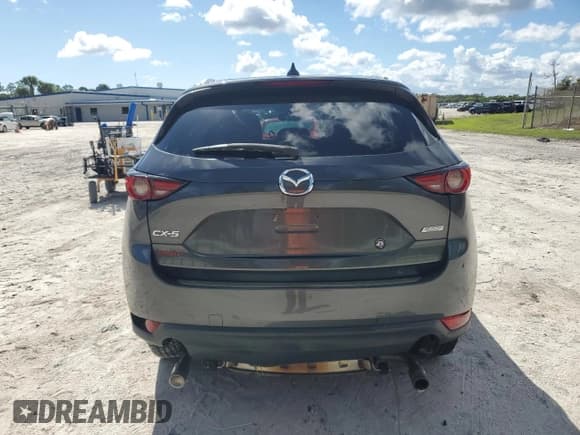 ✅ 2019 Mazda CX-5 Grand Touring • VIN: JM3KFADM7K0622051 • Lot: 86213585. Listed on Copart with 68,022 mi. Free auction sales archive from the USA and detailed vehicle history report at DreamBid. Image 6.
