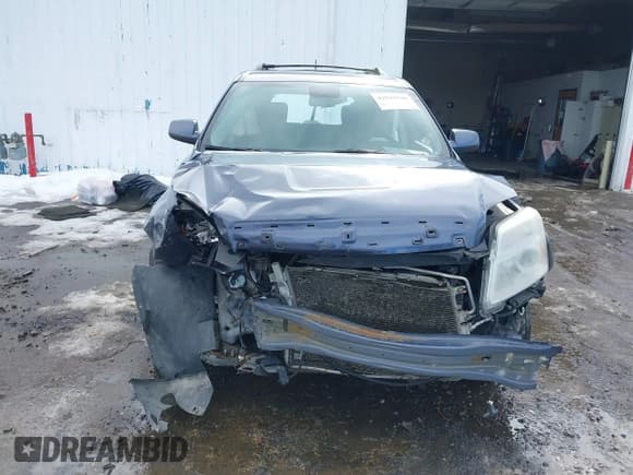 ✅ 2014 GMC Terrain SLE • VIN: 2GKFLWEK0E6355848 • Lot: 41592246. Listed on IAAI with 145,471 mi. Free auction sales archive from the USA and detailed vehicle history report at DreamBid. Image 12.