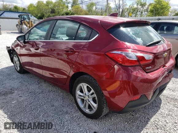 ✅ 2018 Chevrolet Cruze LT • VIN: 3G1BE6SM0JS634117 • Lot: 50969153. Listed on Copart with 99,385 mi. Free auction sales archive from the USA and detailed vehicle history report at DreamBid. Image 2.