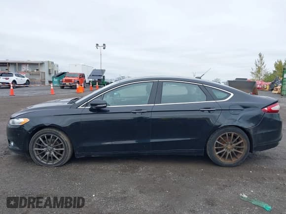 ✅ 2016 Ford Fusion SE • VIN: 3FA6P0H90GR266532 • Lot: 43350639. Listed on IAAI with 179,687 mi. Free auction sales archive from the USA and detailed vehicle history report at DreamBid. Image 14.