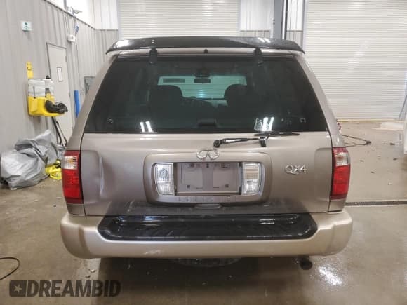 ✅ 2001 Infiniti QX4 Luxury • VIN: JNRDR09Y81W214250 • Лот: 77974094. Опубликован ранее на Copart с пробегом 214 564 миль. Бесплатный доступ к архиву аукционных продаж из США и подробный отчёт об истории автомобиля на DreamBid. Изображение 6.