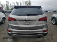 ✅ 2017 Hyundai Santa Fe 2.4L • VIN: 5NMZTDLB6HH002351 • Лот: 52313844. Опубликован ранее на Copart с пробегом Не указан. Бесплатный доступ к архиву аукционных продаж из США и подробный отчёт об истории автомобиля на DreamBid. Изображение 6.